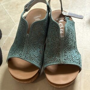 Blue wedge brand is very G size 6 1/2. I would say they run kind of wide.